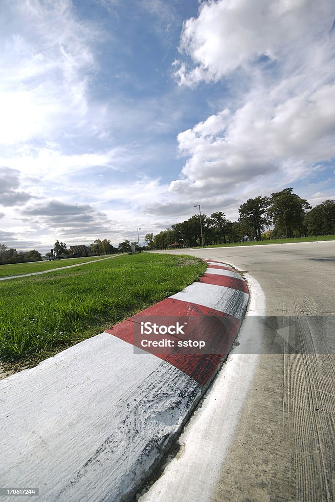 Grand Prix Left Turn Grand Prix left turn on a race track. Sports Track Stock Photo