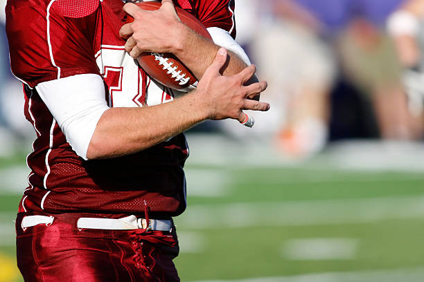 istock Football Catch 170617317