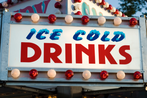 Ice Cold Drinks sign at a carnival.