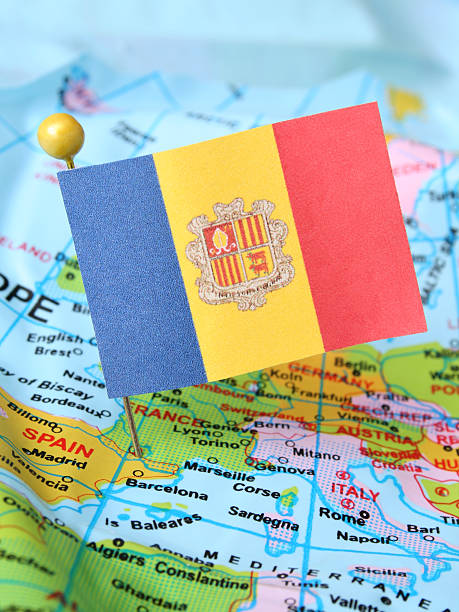 Andorra Andorran flag over cheap plastic map. Shallow depth of field andorra map stock pictures, royalty-free photos & images