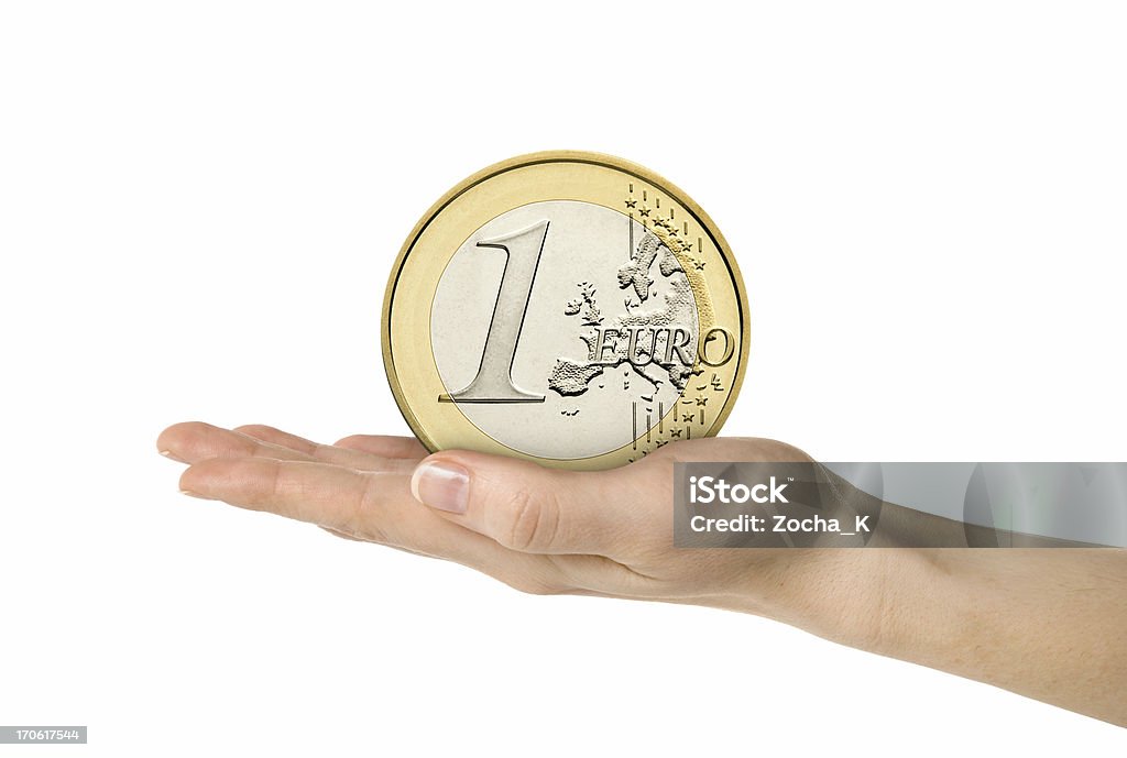 Moeda de Um euro em mão - Royalty-free Moeda de Um Euro Foto de stock