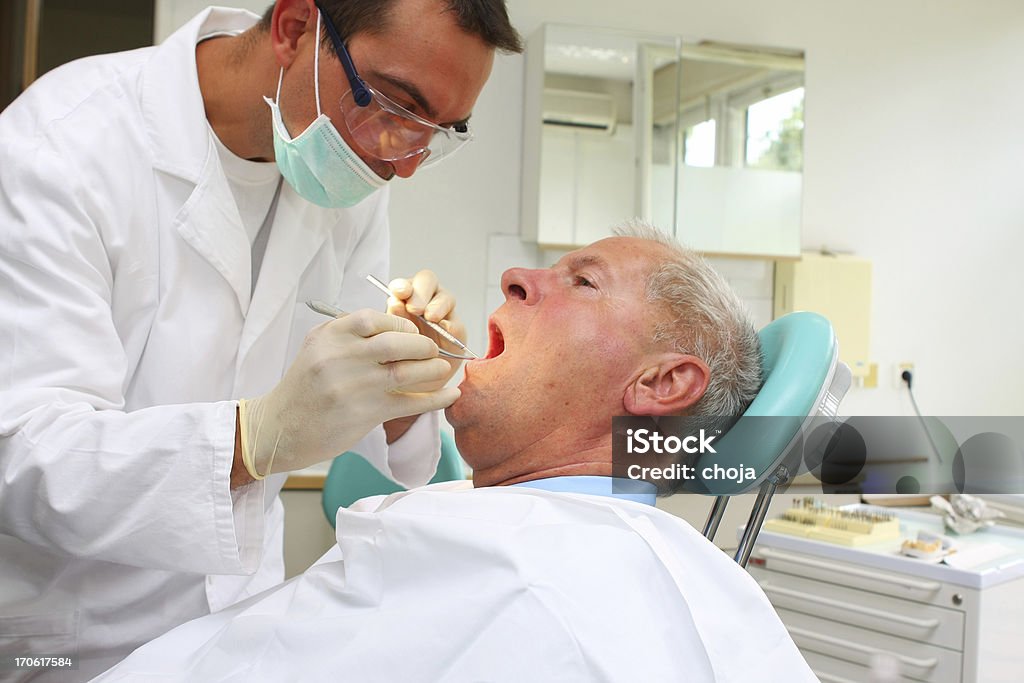 Senior man at the dentist Senior patient at the dentist Dental Equipment Stock Photo