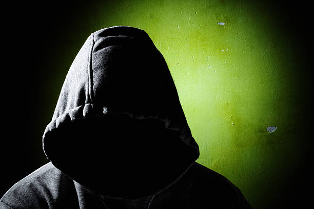 istock dangerous man in the shadow 170617928