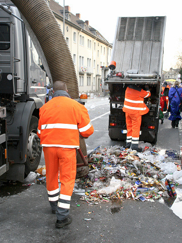 Street sweeper in action after street carnival in Cologne.