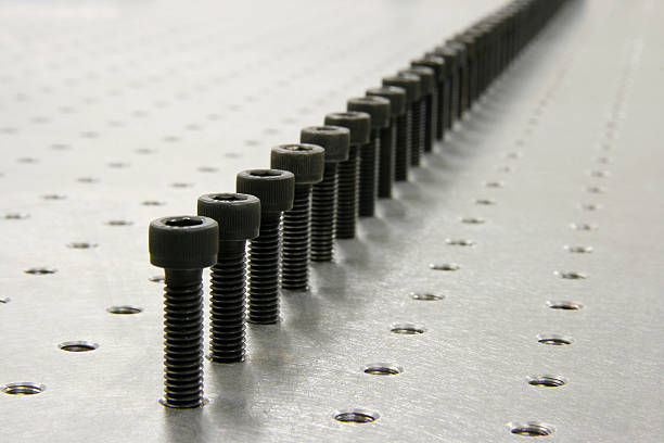 infinty линия винта отверстия таблица - table optical instrument metal steel стоковые фото и изображения