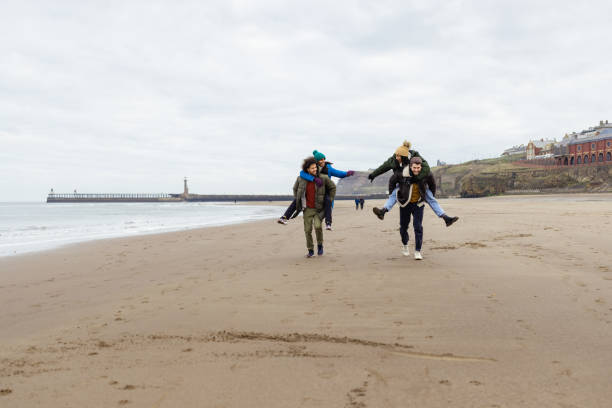 istock Piggyback Race at the Beach 1706187729