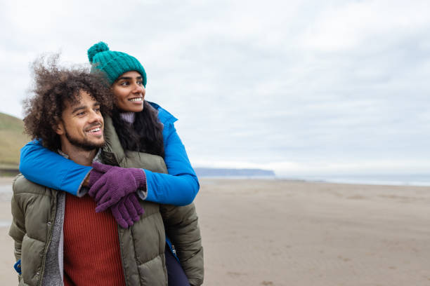 istock Playful Piggyback at the Beach 1706188256