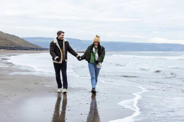 istock Winter Walks by the Coastline 1706189349