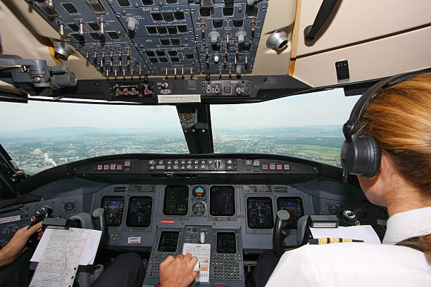 istock Airplane approaching the airport...pilots in cockpit 170618977