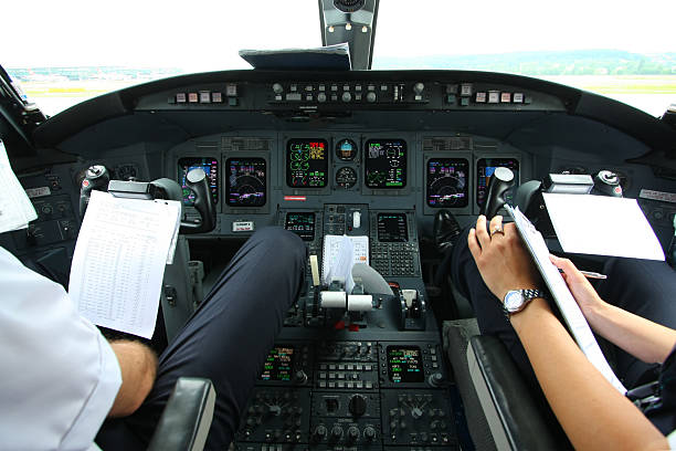 istock Airplane cockpit....Pilots at work checking data of weather 170618983