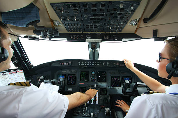 istock Cockpit of an airplane with young pilots flying 170618984