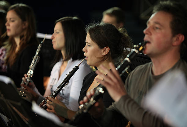 istock Musicians at the concert...brass section playing 170619420