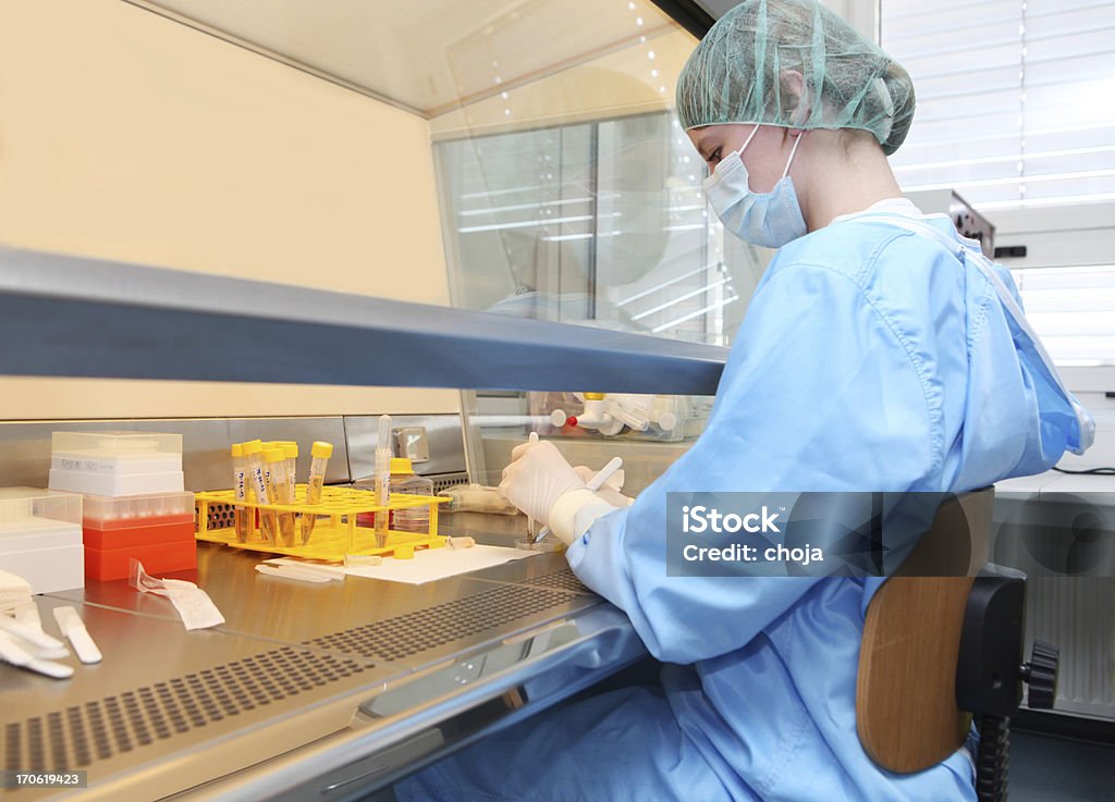 Technician in a biochemical laboratory of blood bank Technician in a blood bank Analyzing Stock Photo