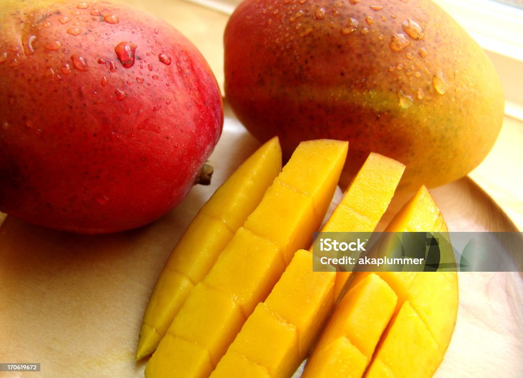 Restaurante Mangos jugoso - Foto de stock de Mango - Fruta tropical libre de derechos