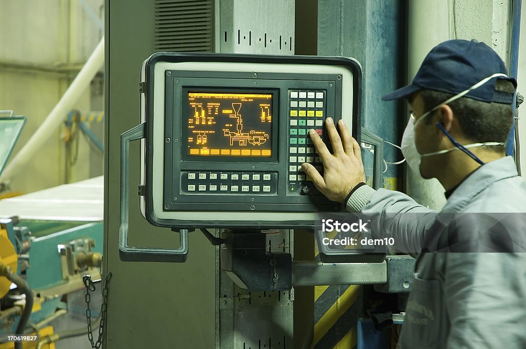 Hand on the touch screen Industry Concept; Also available; Machinery Stock Photo