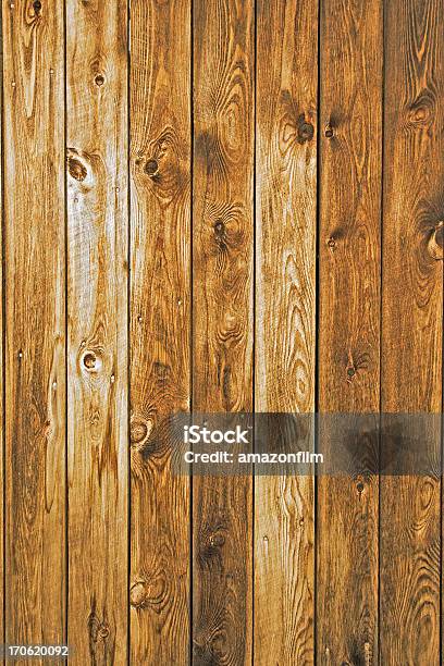 Brown Stained Planks Of Wooden Wall Texture Background Stock Photo - Download Image Now