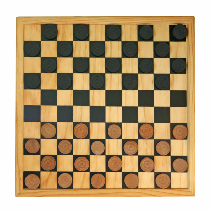 Chessboard and game figures. Blur and selective focus. Top view and shadows