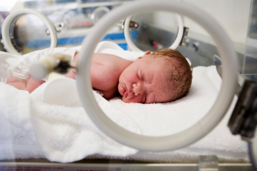 Baby girl, 10 minutes old, in a hospital incubator. Camera: Canon 5D.Many more birth-related images (the thumbnails are only a sample):
