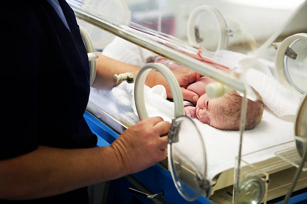 istock Caring for baby in incubator 170620435