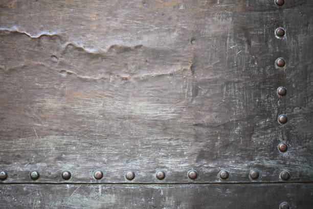 istock Black metal plate or armour texture with rivets 170620835