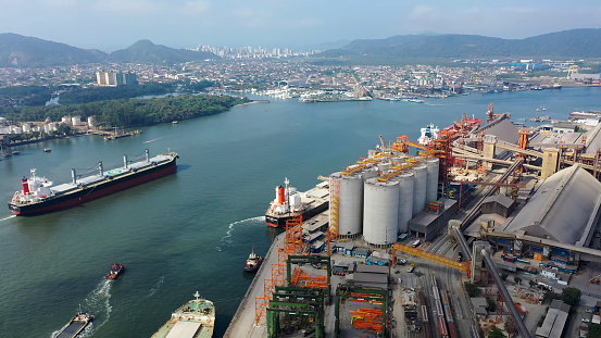 Aerial view of Freight Ship at Santos harbor. Container ship. Santos Port Brazil. Freighter Ship. Maritime Transport.