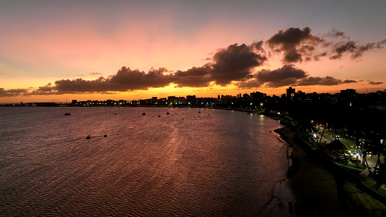 Sunset sky at town of Maceio Alagoas Brazil. Landmark beach at Northeast Brazil. Tropical Travel. Vacations destinations. Tourism landmark.