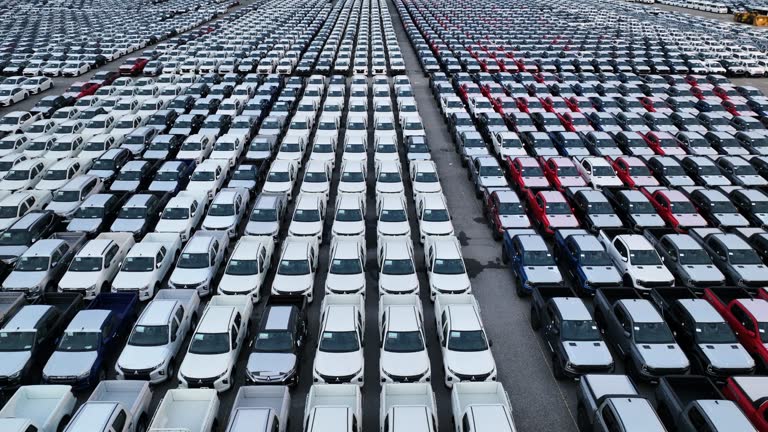 Cars lined up, Depot of new cars ready to be distributed