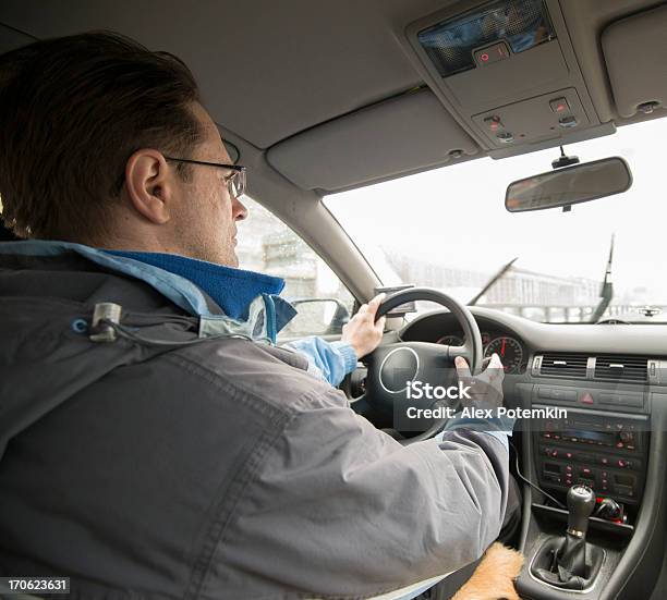 Man Driving Car On The Streets Of Moscow Russia Stock Photo - Download Image Now - Driveway, Driving, Men