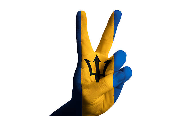 istock barbados national flag two finger up gesture for victory 170625595