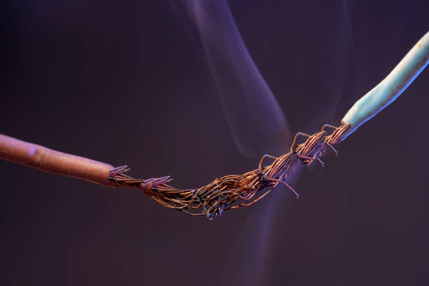 Electric wire and smoke is meant to symbolize blown insulation or overheating