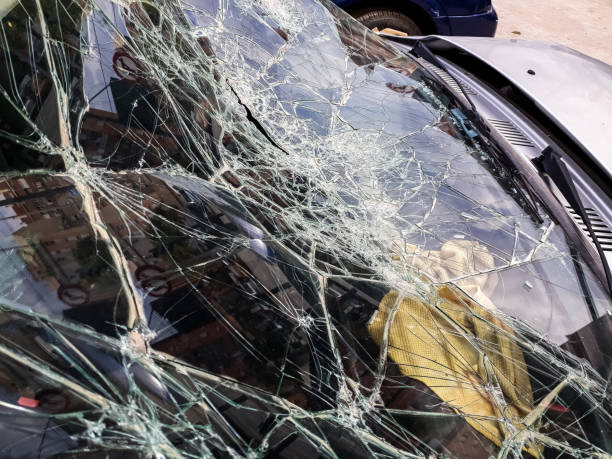 istock Broken windshield of abandoned and destroyed car, with broken glass. 1706266029