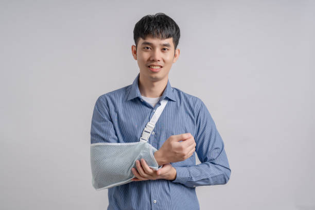 istock Businessman wears cast on his broken arm after an accident. 1706287775