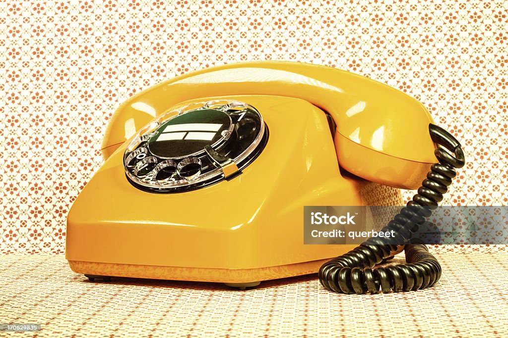 Retro orange telephone Telephone Stock Photo