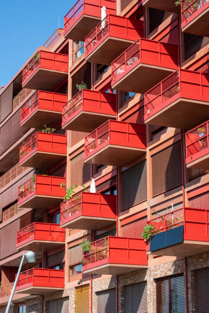 istock Red apartment building with big balconies 1706300835
