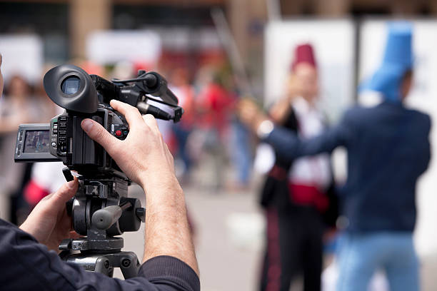 istock Covering an event with a video camera 170630289