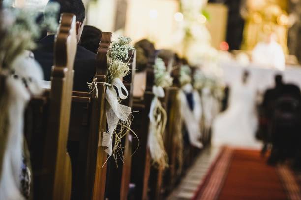 istock Wedding ceremony in a church, hallway behind 1706309931