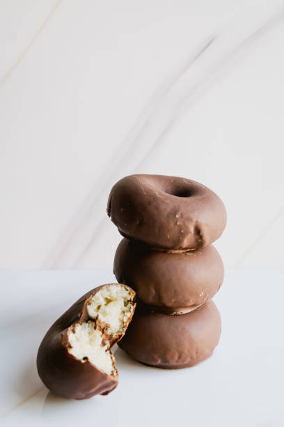 istock Stacked chocolate ticklers, isolated on white background. Vertical shot.. 1706321440
