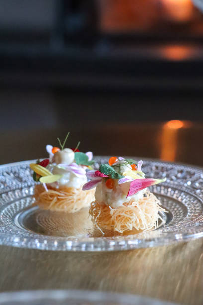 istock Michelin star gourmet appetizer plates at elegant restaurant 1706331759