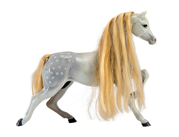 istock White statue horse blonde mane isolated on white 170633183