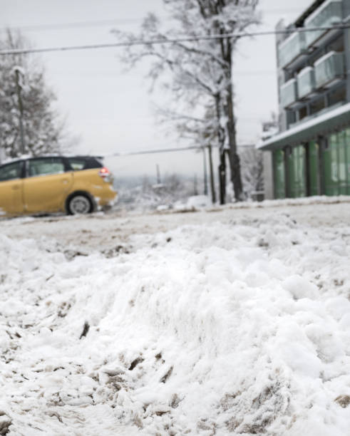 istock Deep slush on street after snow storm. 1706345273