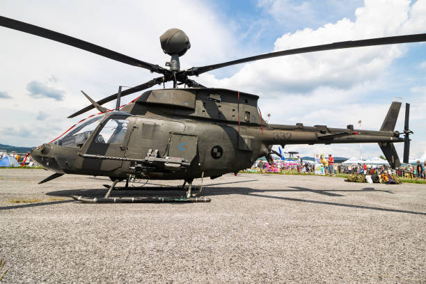 Croatian Air Force Bell OH-58D Kiowa Warrior 332 attack helicopter static display at SIAF Slovak International Air Fest 2019 Sliac / Slovakia - August 3, 2019: Croatian Air Force Bell OH-58D Kiowa Warrior 332 attack helicopter static display at SIAF Slovak International Air Fest 2019 kiowa stock pictures, royalty-free photos & images