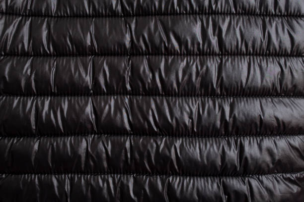 istock Sewing lines on synthetic fiber fabric, close up abstract texture 1706352890