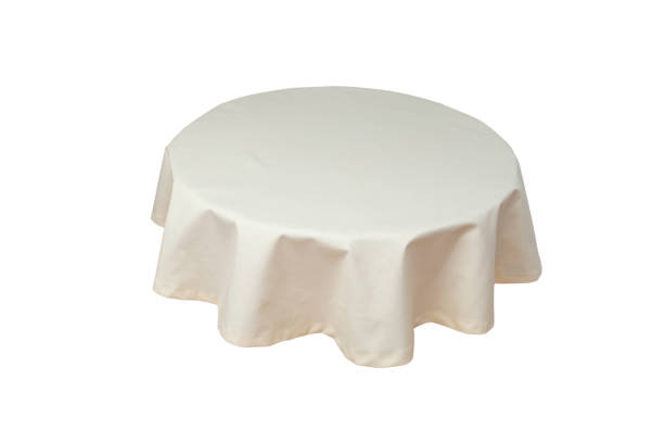 istock White cloth on a round shaped table, side view isolated on white 1706353474