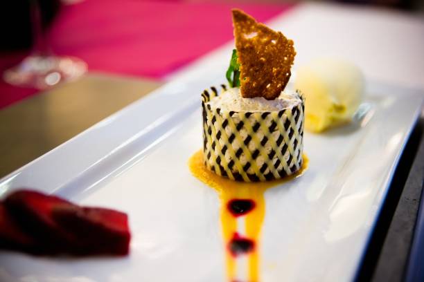 Desserts with fruits, biscuit mousse plated at a wedding.