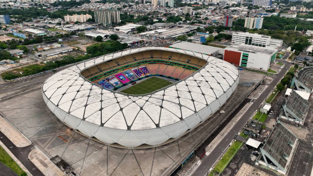 Panorama aerial view of Amazon Arena Soccer Stadium at downtown city Manaus Brazil. Cityscape of tourism landmark city. Sports Center Amazon Arena at downtown Manaus Brazil.