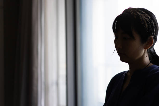 istock A woman who is physically or mentally unhealthy 1706386410