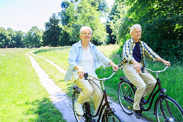 istock Happy senior couple with bicycle 170639297