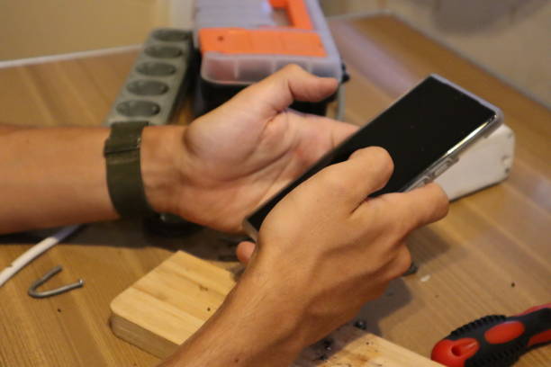 istock male hands repairing a tee 1706394688