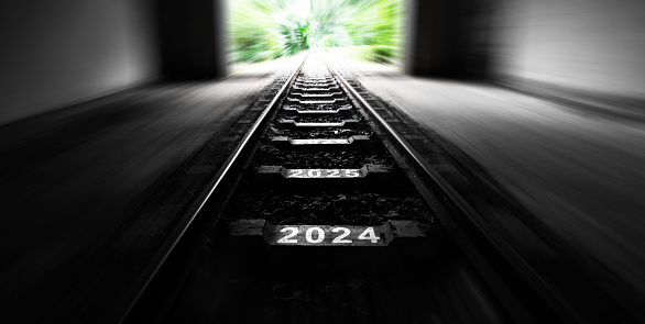 New year number of 2024 and 2025 on railroad track