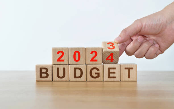 istock Number 2023 change to 2024 with word budget on the table 1706407477